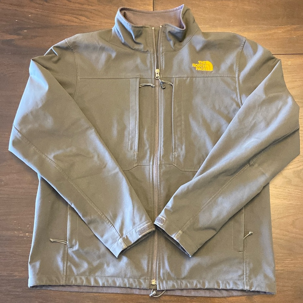 The North Face- Light jacket - Size L - Iron(yellow logo) - Condition 9/10.